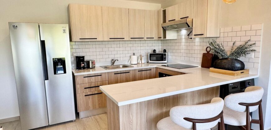 Caribbean Dream 2BR Downtown – Pool & Gym Punta Cana